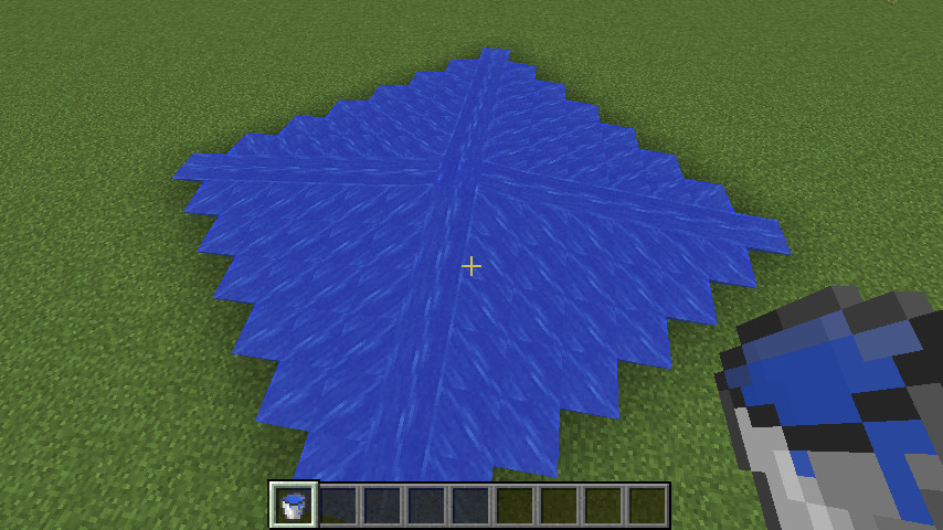 A screenshot from minecraft showing water flowing out from a block